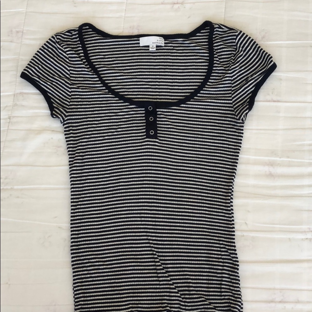 striped shirt halfway buttoned